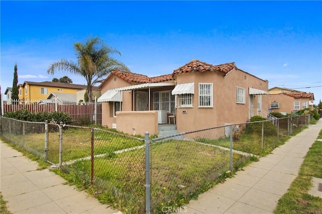 159 E 105th St, Los Angeles, CA 90003 - mediterranean / spanish-style home with stucco siding and a tiled roof