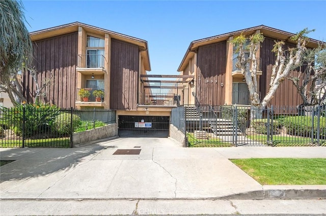 view of property featuring a fenced front yard