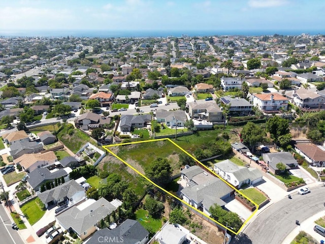 aerial view of residential area with property boundaries highlighted