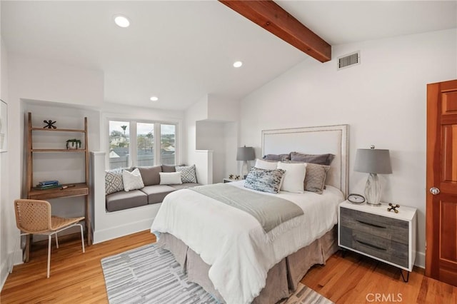 bedroom with light wood finished floors and recessed lighting