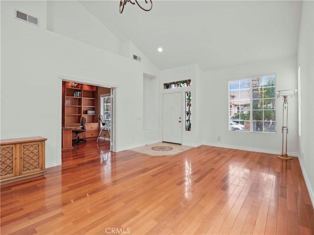 entryway featuring visible vents, a wealth of natural light, and light wood-type flooring