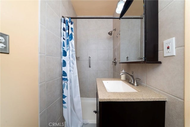 full bath featuring vanity and shower / bathtub combination with curtain