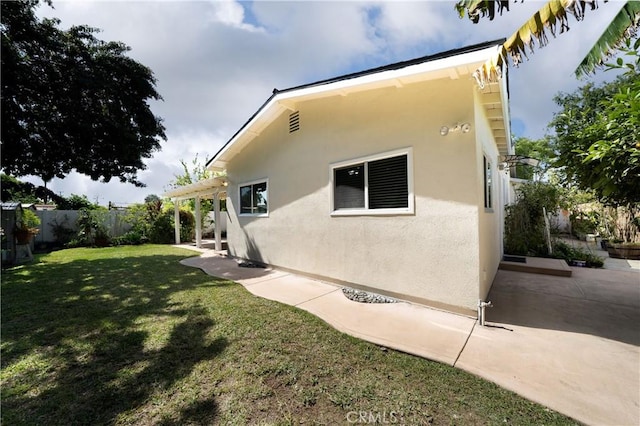 1626 Grove Pl, Fullerton, CA 92831 - rear view of property with a lawn, a patio, fence, and stucco siding