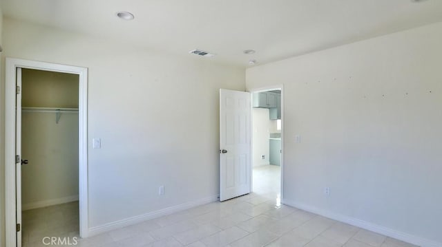 13241 Fairview St, Garden Grove, CA 92843 - unfurnished bedroom with baseboards, visible vents, a spacious closet, and a closet