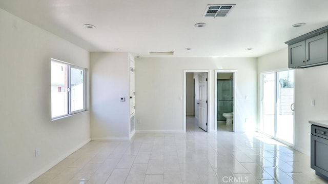 13241 Fairview St, Garden Grove, CA 92843 - interior space featuring visible vents, baseboards, and a healthy amount of sunlight