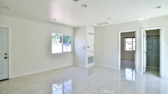 13241 Fairview St, Garden Grove, CA 92843 - unfurnished bedroom featuring baseboards, light tile patterned flooring, and multiple windows