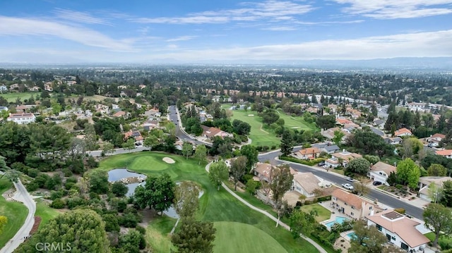 birds eye view of property featuring a water view, golf course view, and a residential view