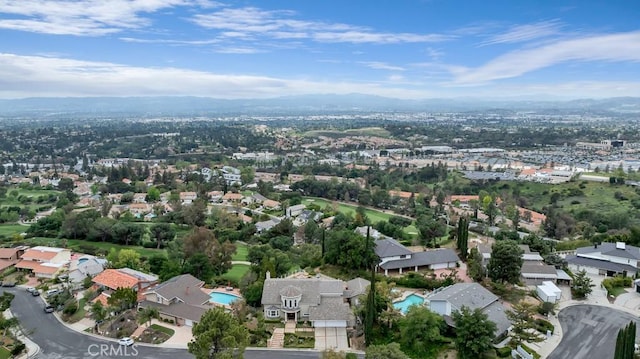 birds eye view of property with a residential view