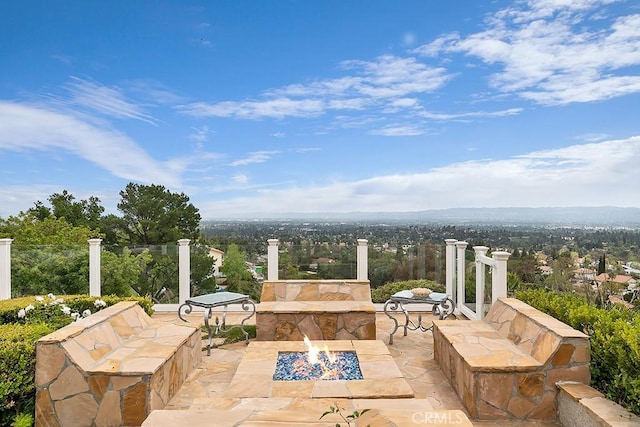 view of patio featuring a fire pit