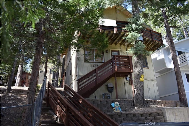 26241 Boulder Ln, Twin Peaks, CA 92391 - view of side of home featuring stairway