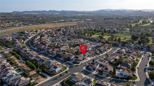 aerial view with a mountain view and a residential view