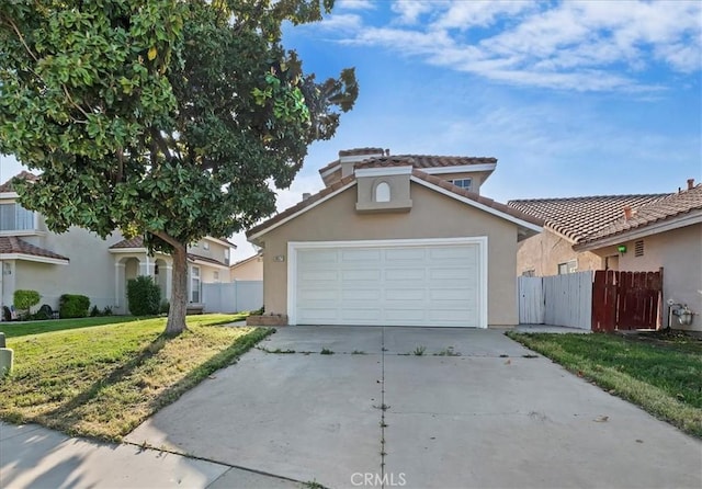 traditional-style home with a front lawn, stucco siding, fence, and concrete driveway