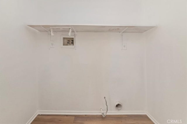 laundry room with baseboards, wood finished floors, gas dryer hookup, and hookup for a washing machine
