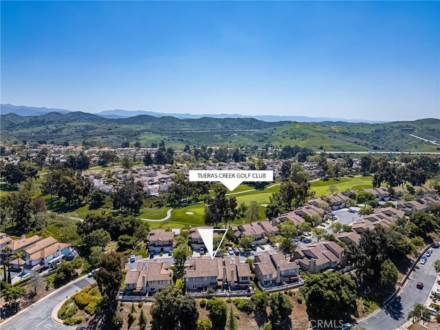 drone / aerial view with a residential view and a mountain view
