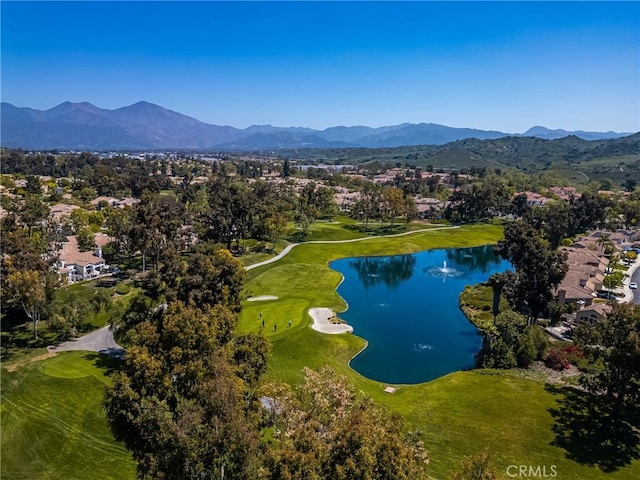 birds eye view of property featuring a water and mountain view, golf course view, and a residential view