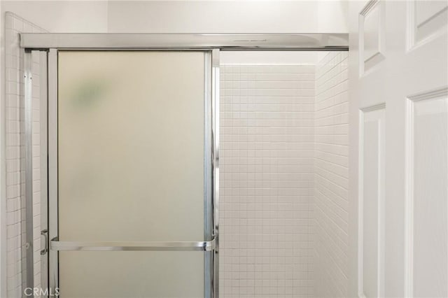 bathroom with a stall shower