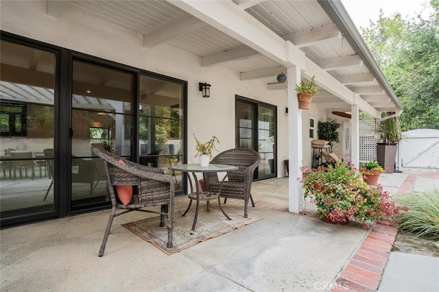 view of patio featuring a gate