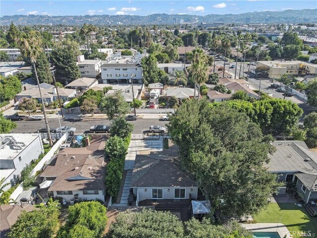 bird's eye view featuring a mountain view and a residential view