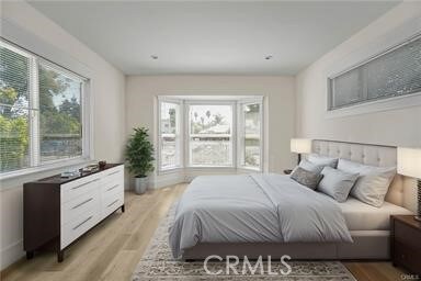 bedroom featuring light wood-type flooring