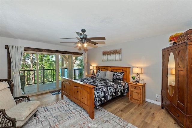 28844 Cedar Dr, Lake Arrowhead, CA 92352 - bedroom with access to exterior, light wood-style flooring, and a ceiling fan