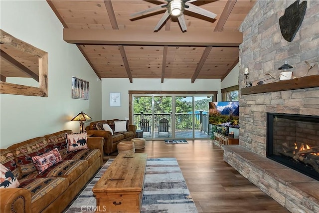 living room featuring beam ceiling, a ceiling fan, wood finished floors, and wooden ceiling