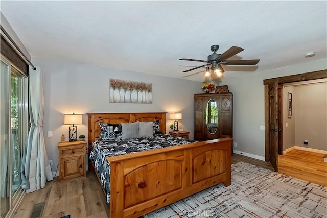 28844 Cedar Dr, Lake Arrowhead, CA 92352 - bedroom featuring light wood-style floors and a ceiling fan