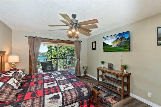 28844 Cedar Dr, Lake Arrowhead, CA 92352 - bedroom with access to outside, wood finished floors, a textured ceiling, and a ceiling fan