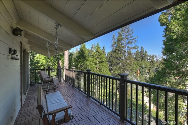 28844 Cedar Dr, Lake Arrowhead, CA 92352 - balcony featuring view of wooded area