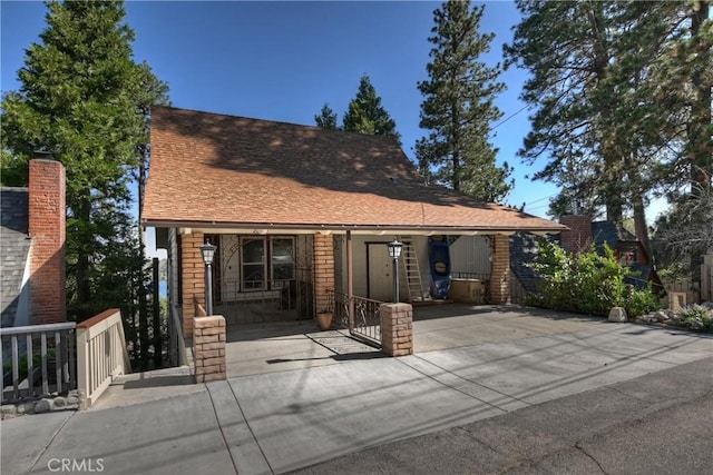 28844 Cedar Dr, Lake Arrowhead, CA 92352 - view of front of home featuring covered porch