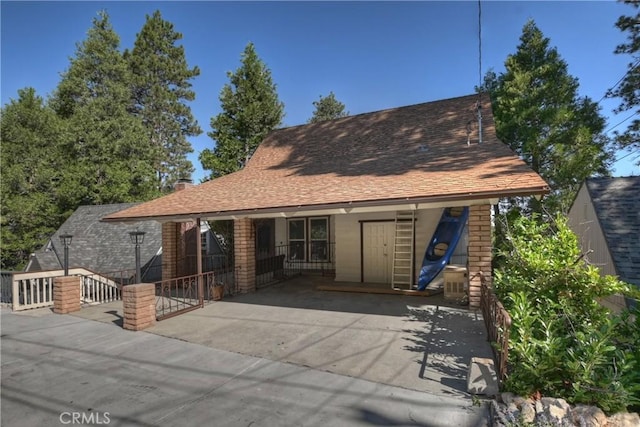 28844 Cedar Dr, Lake Arrowhead, CA 92352 - view of front of house with roof with shingles