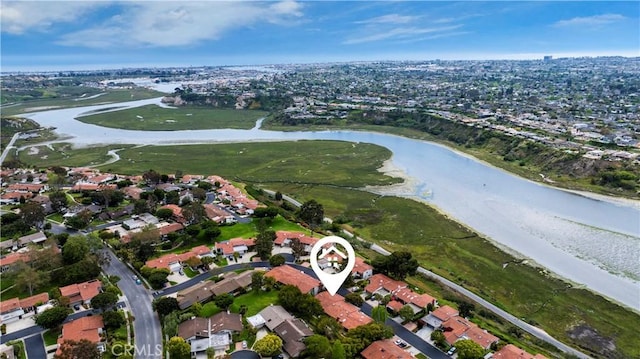 aerial view featuring a residential view and a water view