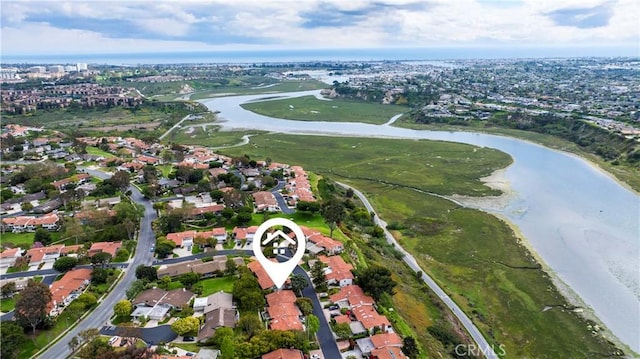 aerial view with a water view and a residential view