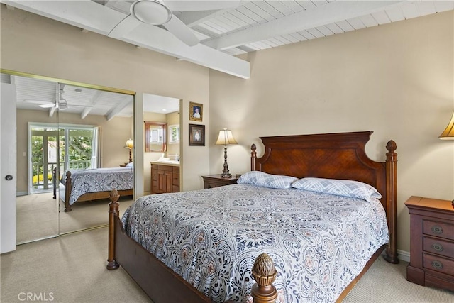 bedroom with carpet, wood ceiling, baseboards, and beamed ceiling