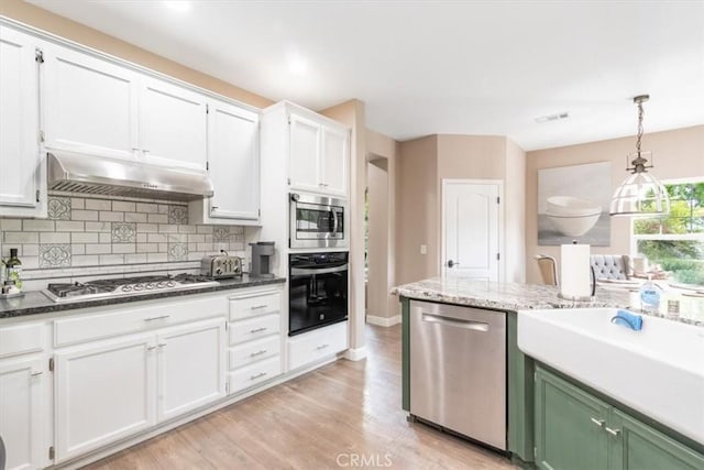 3065 Tierra Mesa, Atascadero, CA 93422 - kitchen featuring appliances with stainless steel finishes, under cabinet range hood, and white cabinets