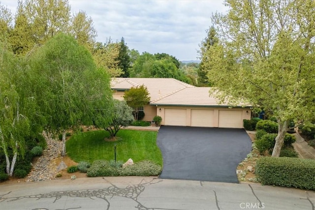 3065 Tierra Mesa, Atascadero, CA 93422 - view of front of home featuring a tile roof, a garage, driveway, and stucco siding