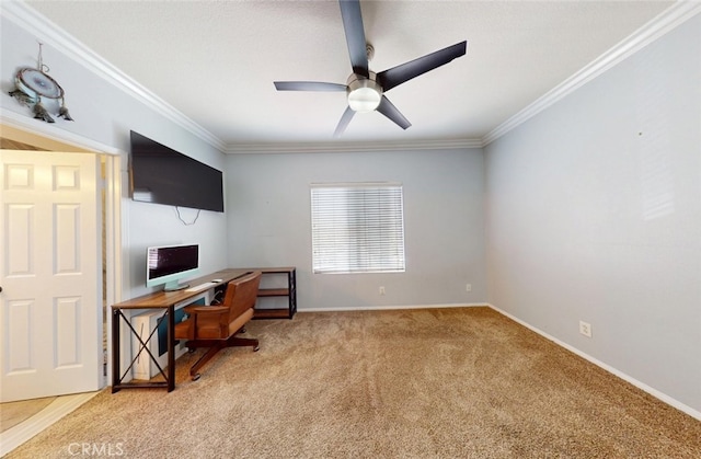 office area with baseboards, a ceiling fan, light carpet, and ornamental molding