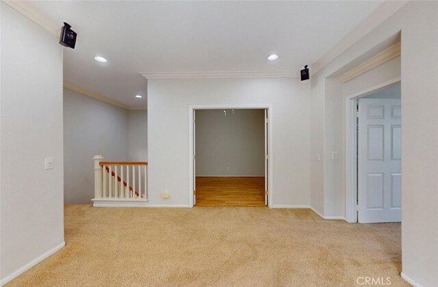 18672 Park Meadow Ln, Huntington Beach, CA 92648 - carpeted empty room with baseboards, ornamental molding, and recessed lighting