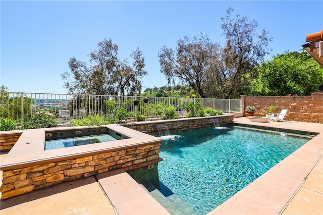 view of pool featuring an in ground hot tub, a fenced in pool, and a fenced backyard