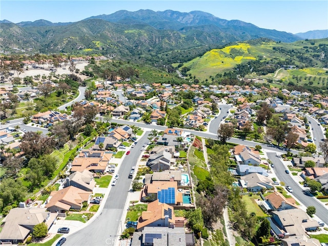 bird's eye view with a mountain view and a residential view