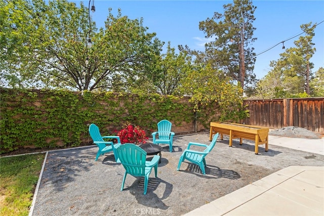 32701 Juniper Berry Dr, Winchester, CA 92596 - fenced backyard with a fire pit and a patio