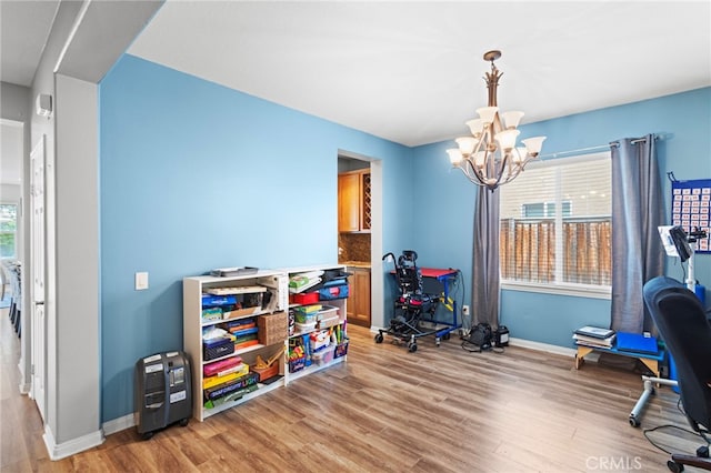 32701 Juniper Berry Dr, Winchester, CA 92596 - game room with a chandelier, light wood-type flooring, and baseboards