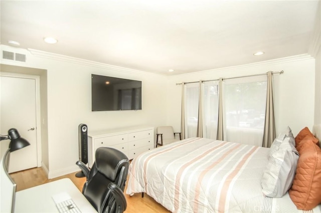 bedroom featuring recessed lighting, visible vents, ornamental molding, and light wood-type flooring