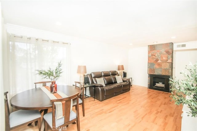 25957 Via Pera Unit C4, Mission Viejo, CA 92691 - living room featuring visible vents, recessed lighting, wood finished floors, and a tile fireplace