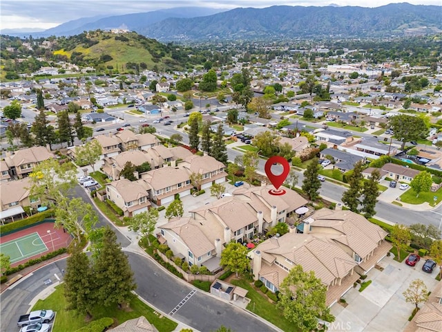 aerial view featuring a mountain view and a residential view
