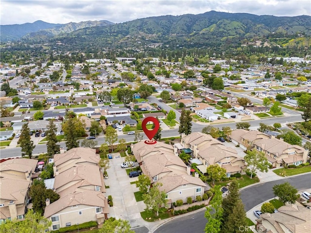 bird's eye view featuring a residential view and a mountain view