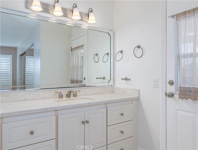 full bath featuring vanity