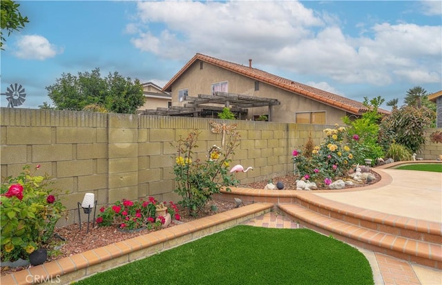 fenced backyard featuring a patio