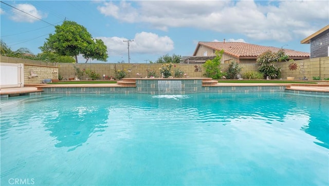view of swimming pool featuring a fenced backyard