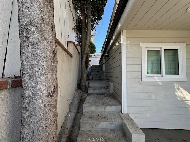 view of home's exterior featuring stairway
