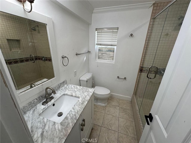 full bathroom with vanity, toilet, tile patterned floors, and a stall shower